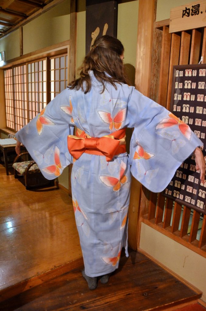 Trying on blue and orange butterfly yukata